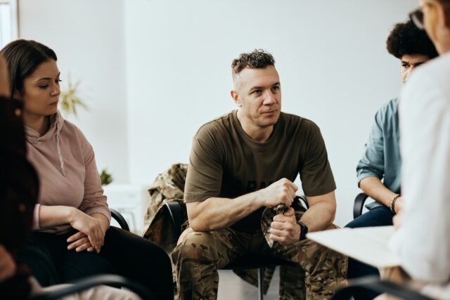 Mid,Adult,Veteran,Attending,Group,Therapy,Session,At,Mental,Health
