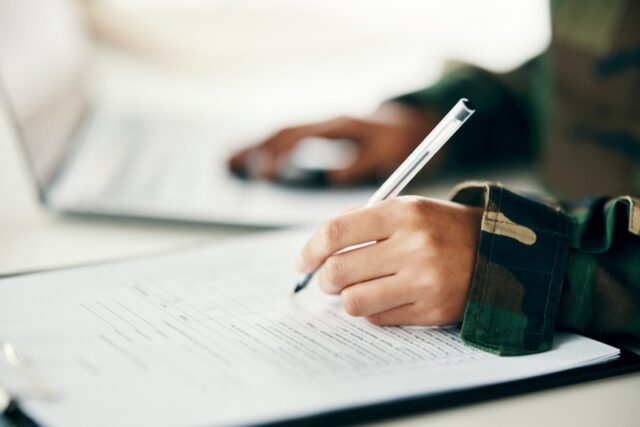 Sign,,Contract,Or,Hands,Writing,On,Army,Application,,Paper,Or