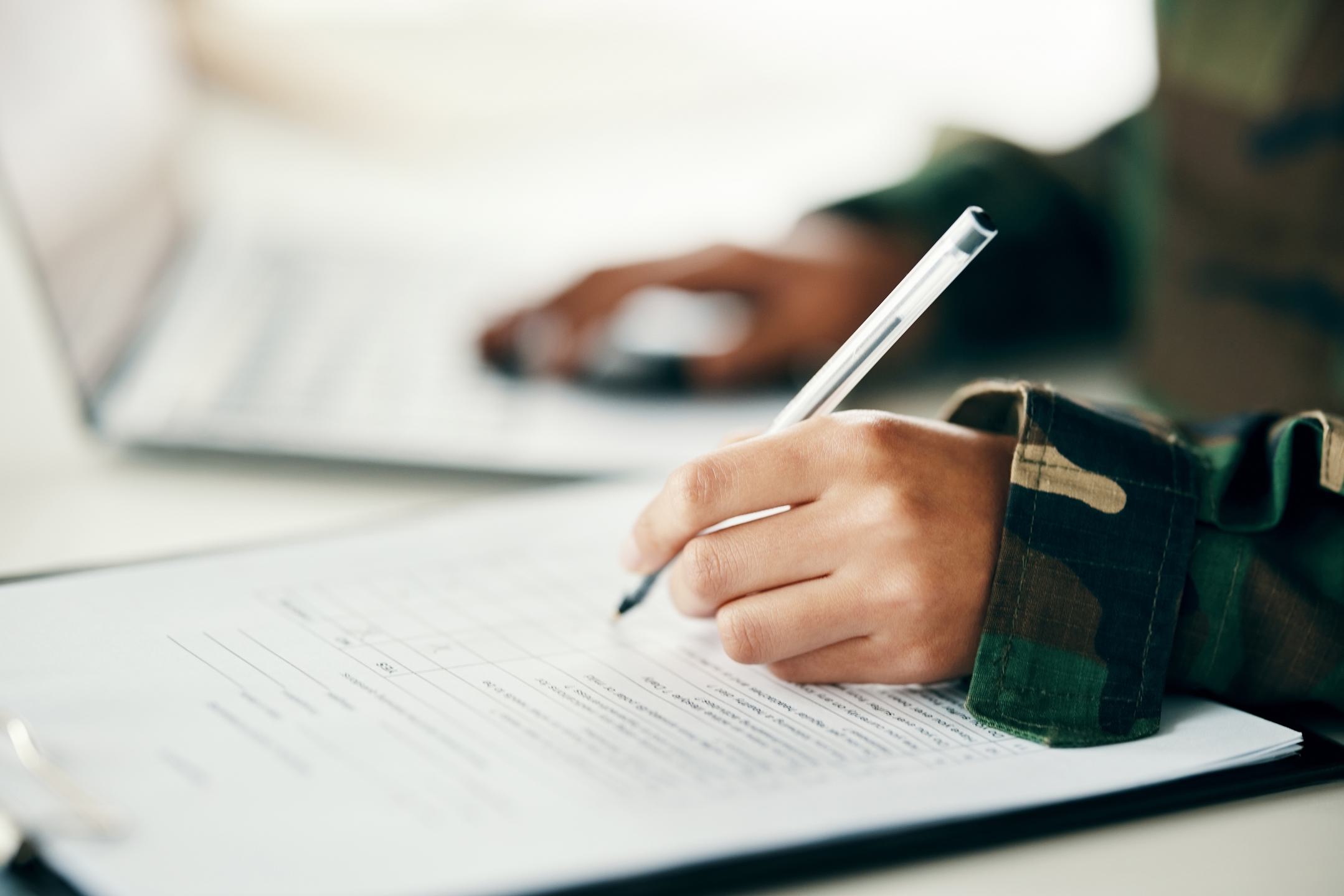 Sign,,Contract,Or,Hands,Writing,On,Army,Application,,Paper,Or